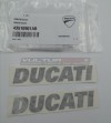 Coppia di emblemi originali Ducati colore grigio
